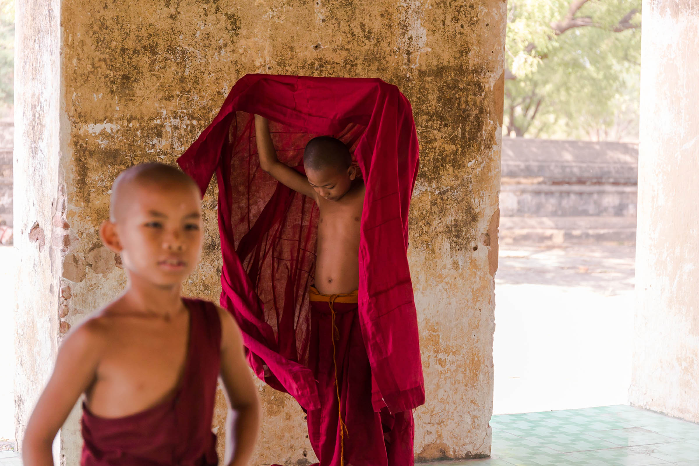 Novice Monks Playing In Monastery In Bagan Myanmar